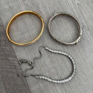 Set of two bangles and one adjustable tennis bracelet